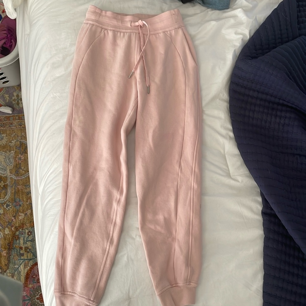 Size 2 lululemon fleece joggers. Light pink color. Barely worn